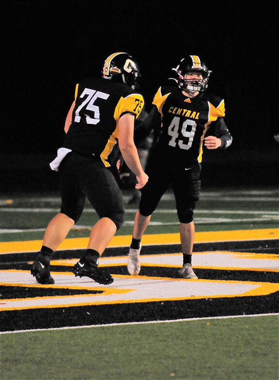 11-9 jc 1 hudson lewandoski and landon clark celebrate Clarks touchdown rush in the fourth quarter.jpg